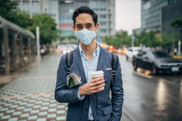 Gentleman With Pollution Mask In Coronavirus Infected City Downtown